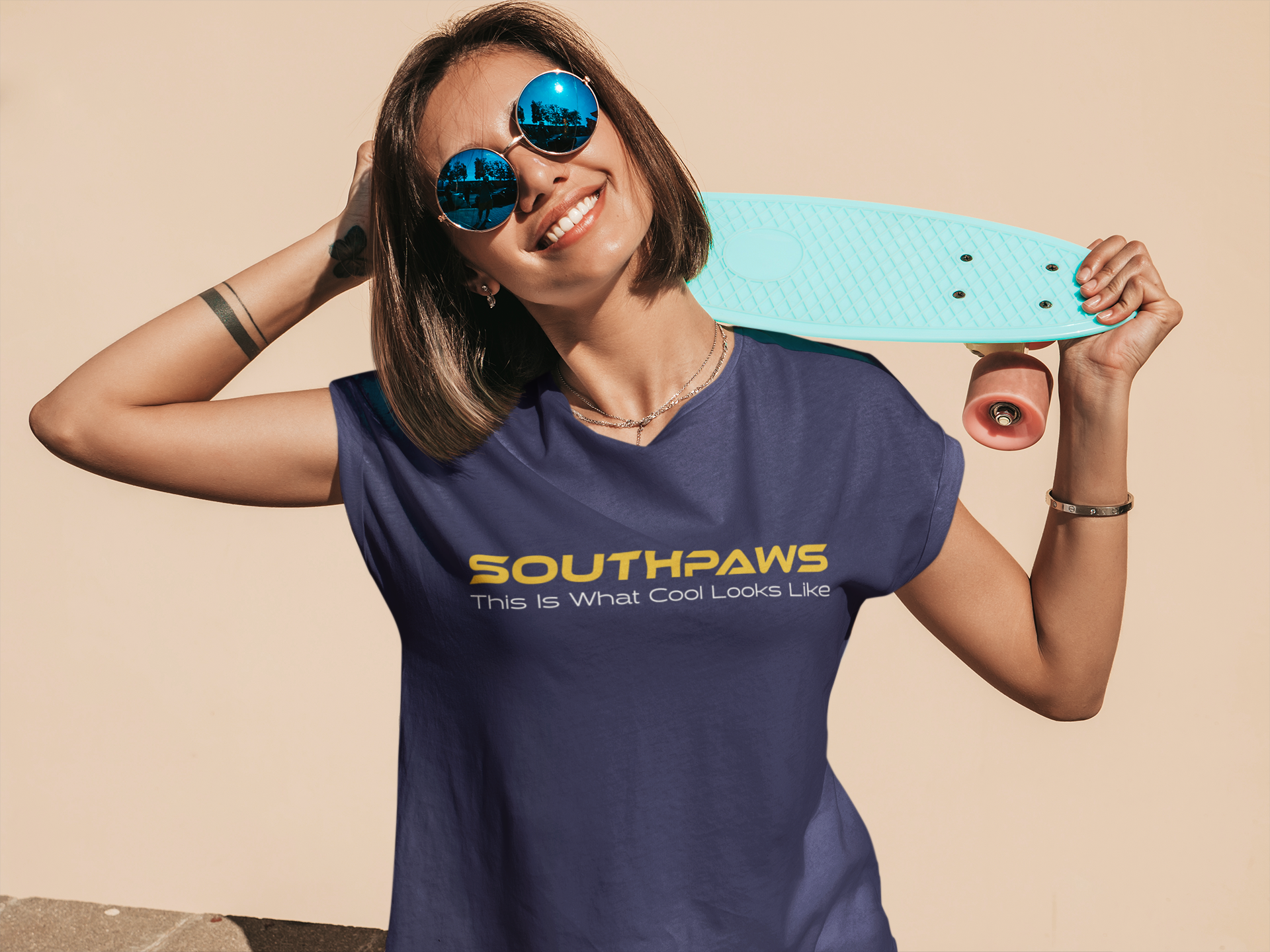 Woman wearing a Left Handed Store shirt in a bright lifestyle photo
